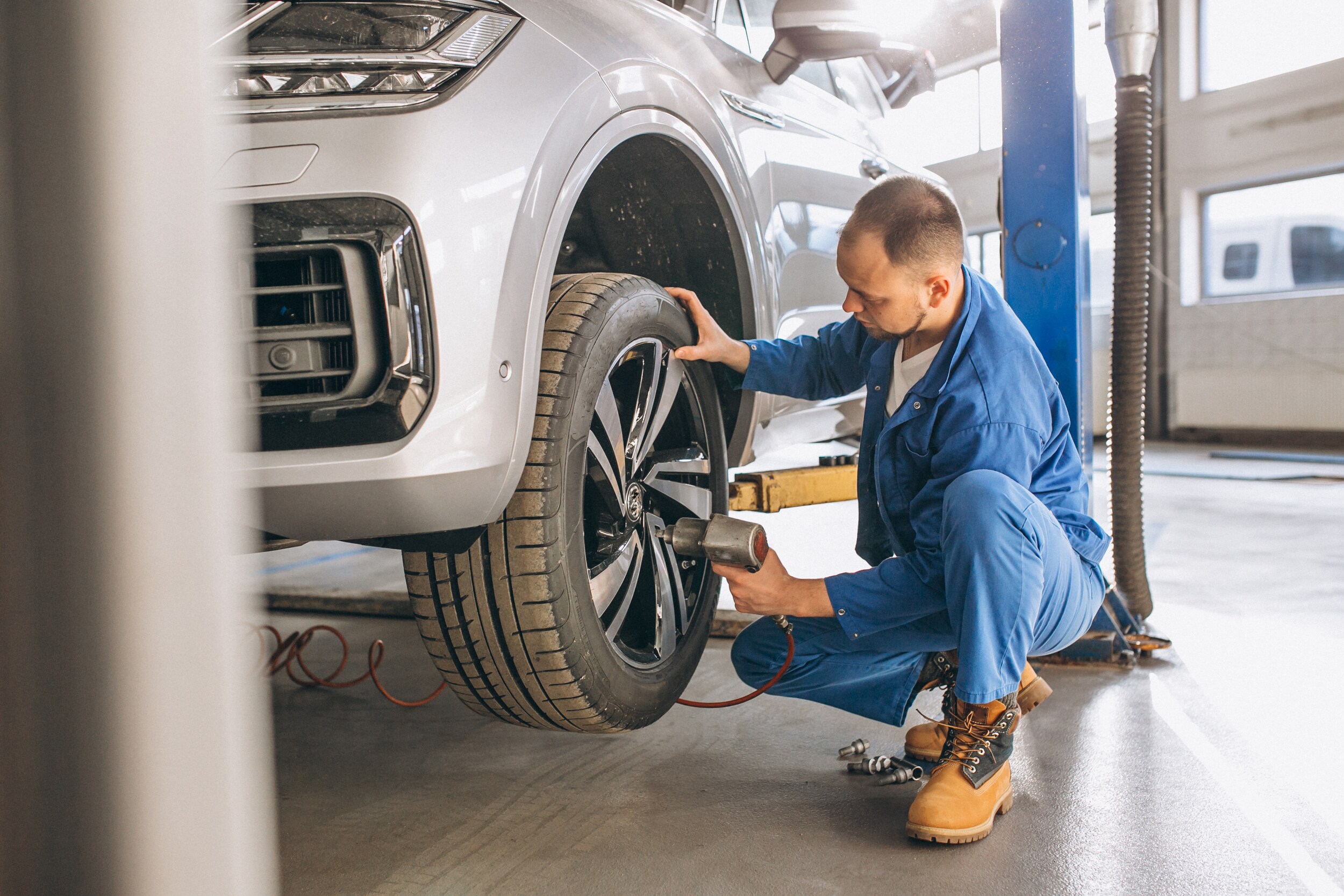 auto-mechanic-checking-car.jpg