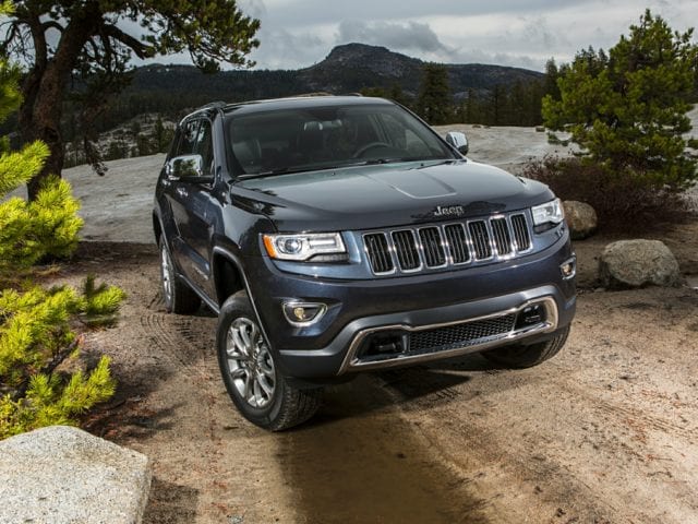 2015 jeep grand cherokee exterior front on dirt road.jpg