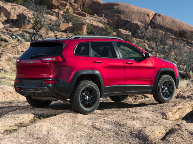 2018 Jeep Cherokee SUV red on rocky terrain.jpg