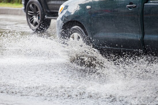 cars driving through flood water.jpg