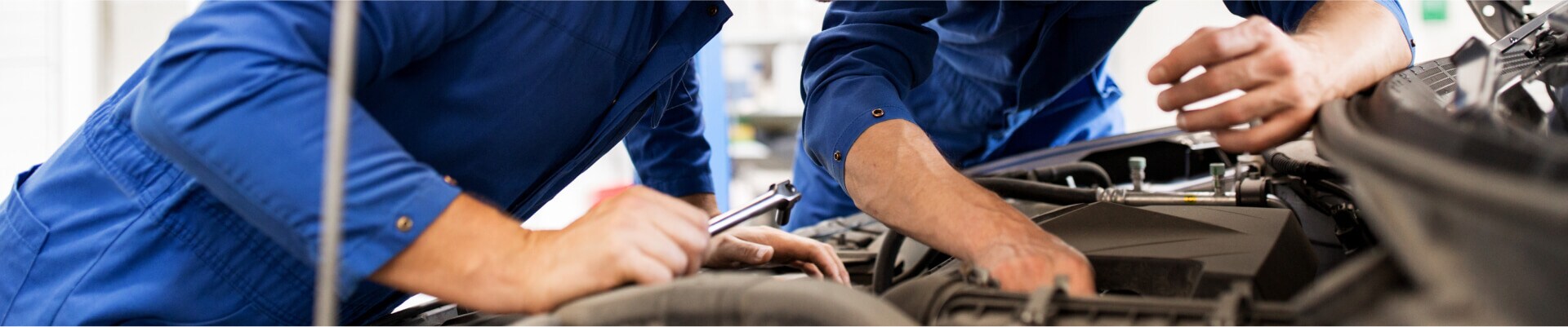BMW Certified Technicians working on a luxury car near Northampton, MA