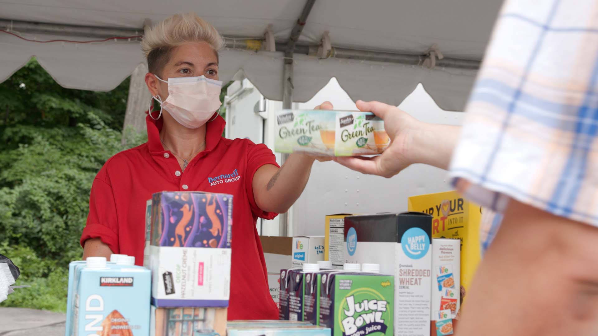 woman accepting food donation