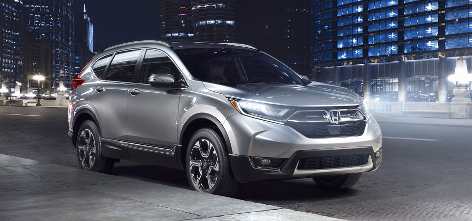 Test Drive a Honda CR-V Today! Silver Honda CR-V Parked