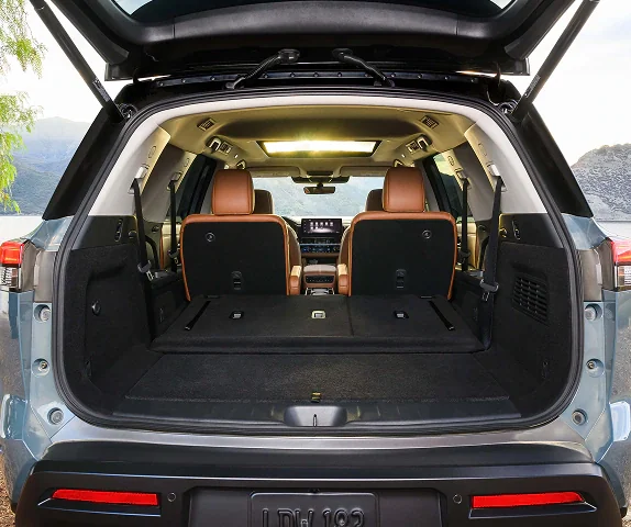 2026 Nissan Pathfinder rear cargo area loaded with camping gear and bags behind the third row