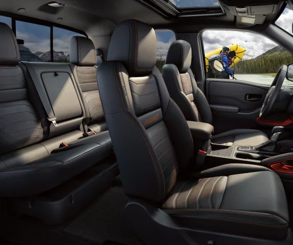 Nissan Frontier Crew Cab PRO-4X leather seating, the cabin to check on a used midsize truck