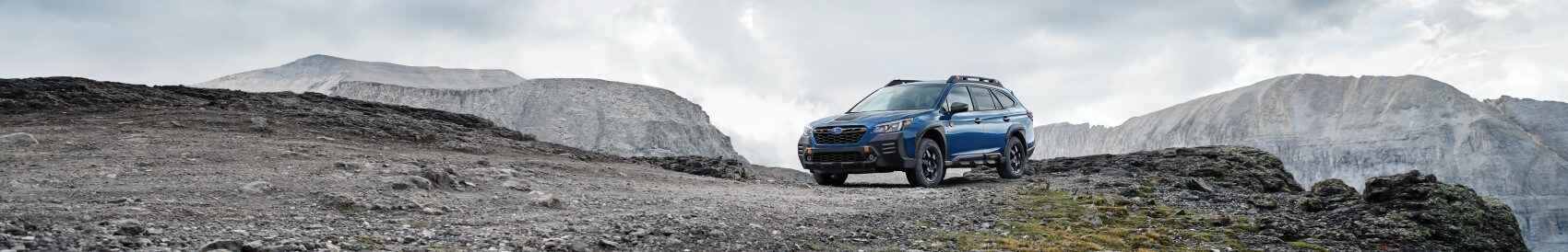 2022 Subaru Outback parked on top of mountain banner.jpg