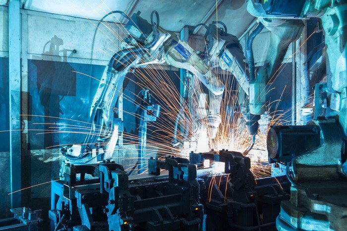 Machine_Working_On_Car_Parts.jpg