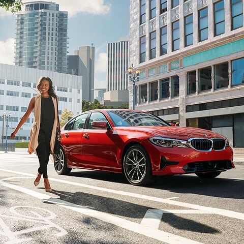BMW red sedan with girl - CPOimg-480x480.png