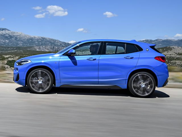 2018 BMW X2 SUV xDrive28i bright blue by mountains.jpg