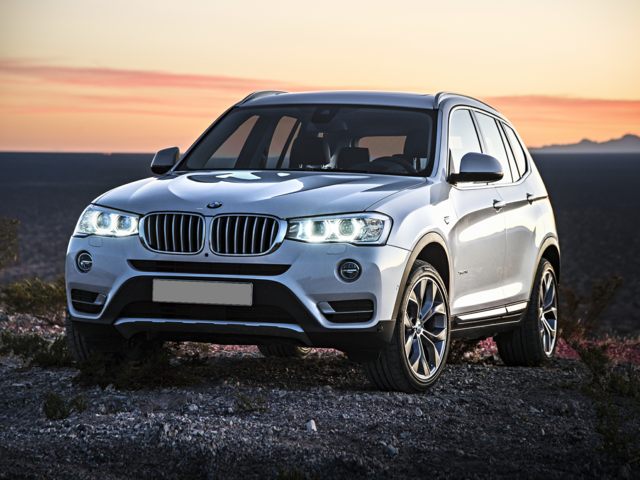 2017 BMW X3 silver angled front veiw with sunset in background.jpg