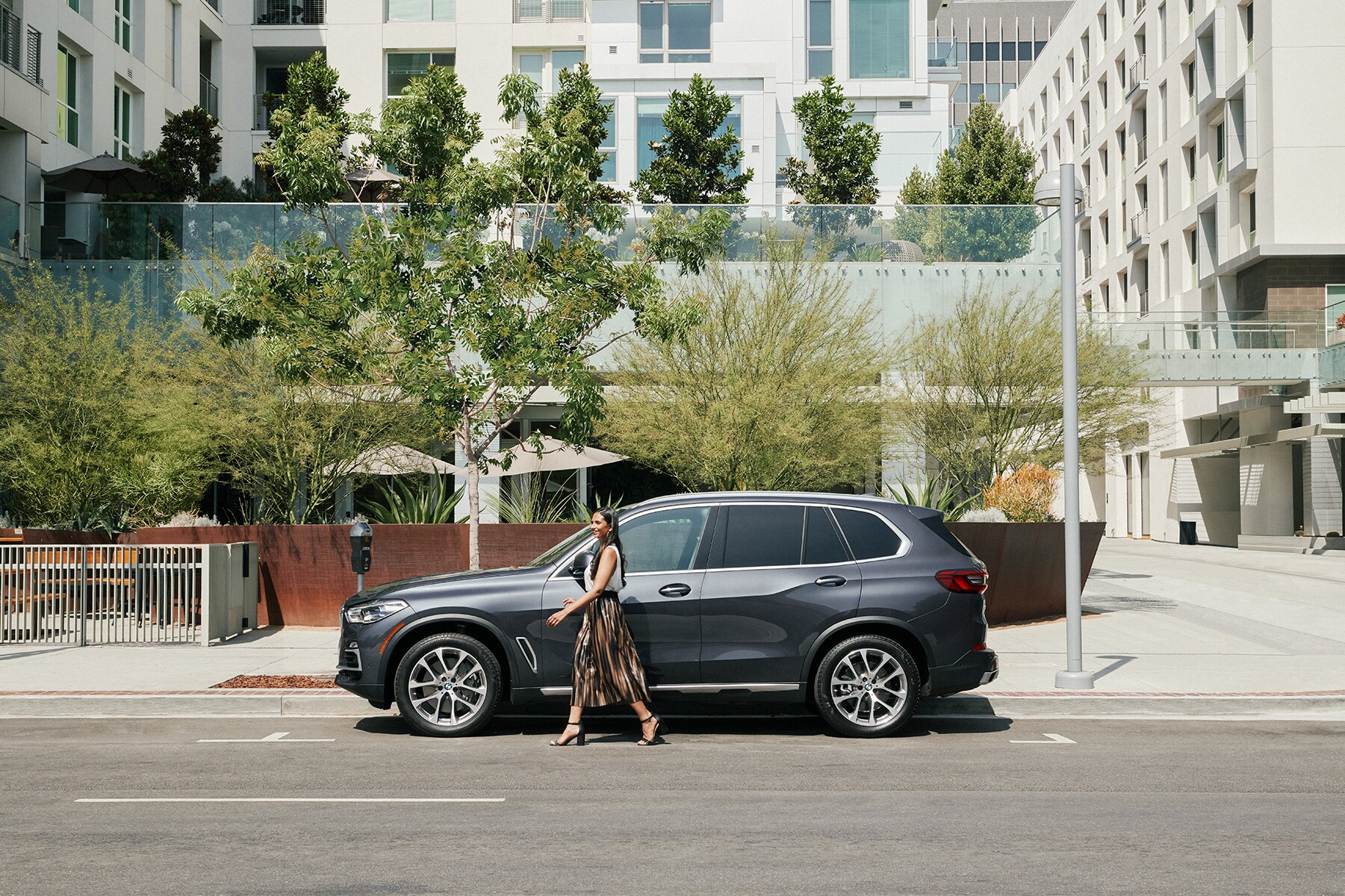 Shop from Home at BMW of Bel Air | 2021 BMW X5 parked outside of city building