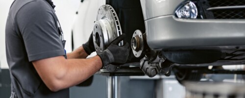 BMW technican working on a BMW vehicle