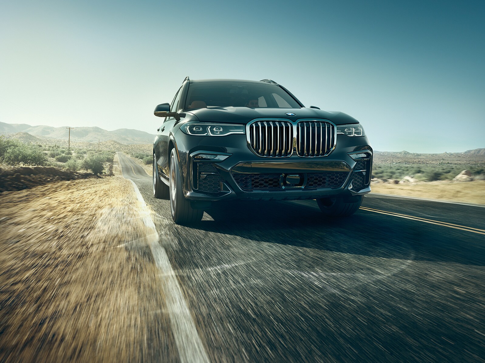 Model Features of the 2020 BMW X7 at BMW of Rockville | Black 2020 BMW X7 running on road Model Features of the 2020 BMW X7 at BMW of Rockville | Black 2020 BMW X7 running on road
