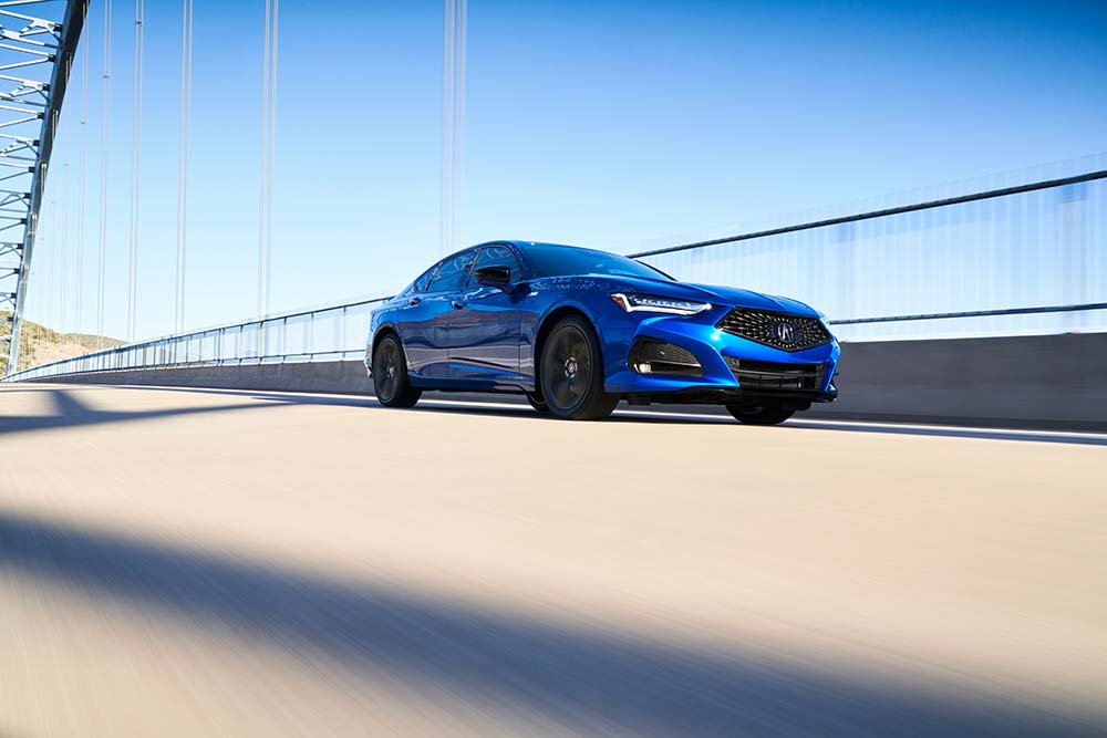 Why drivers should consider an extended warranty on their Acura at Bobby Rahal Acura | 2021 Acura TLX driving on highway