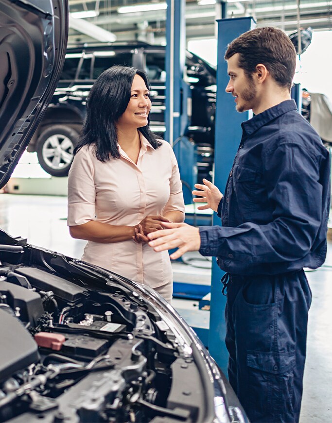What is included in a Multi-Point Inspection? | Bobby Rahal Acura in Mechanicsburg, PA | Mechanic consulting with client about her vehicle
