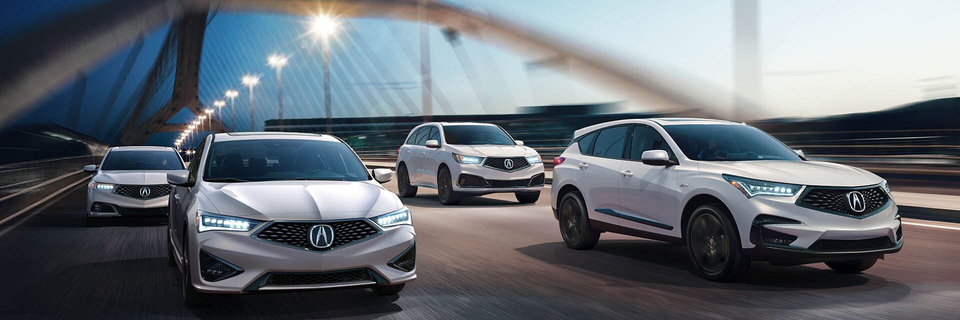 Leasing versus Buying a Acura at Bobby Rahal Acura in Mechanicsburg, PA | 4 White Acuras Varying in Model Driving on Two Lane Bridge Facing Right Towards Camera