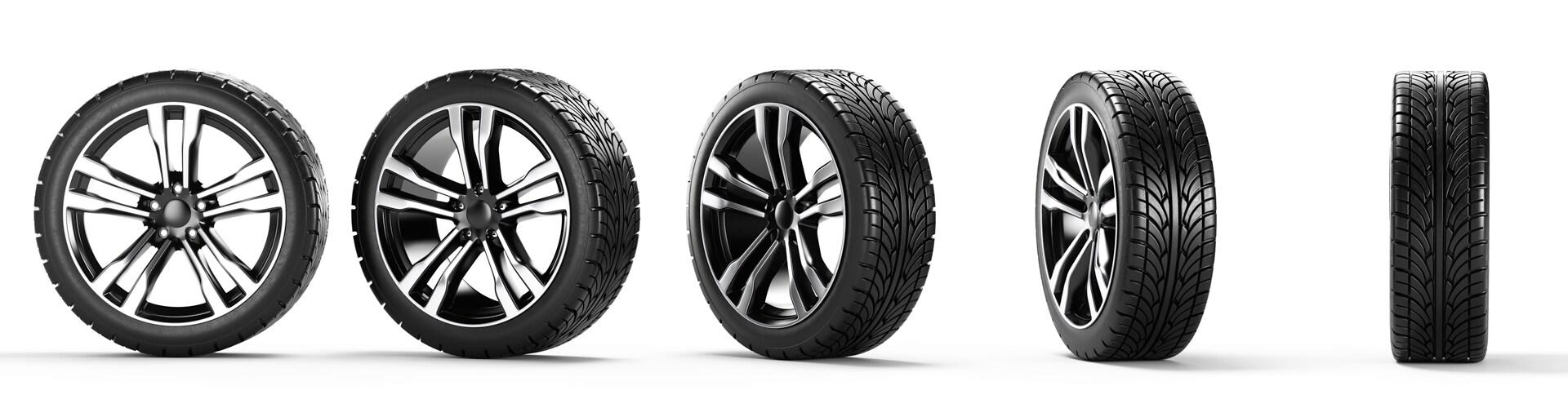 Winter Tires vs. All Season Tires at Bobby Rahal Acura in Mechanicsburg, PA | 5 Tires Standing Up Straight in a Row Each at Different Angles