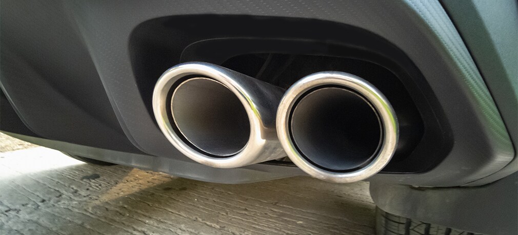 Learn Maintenance Warning Signs at Bobby Rahal Acura in Mechanicsburg, PA | Close up of car exhaust located in the rear of the car