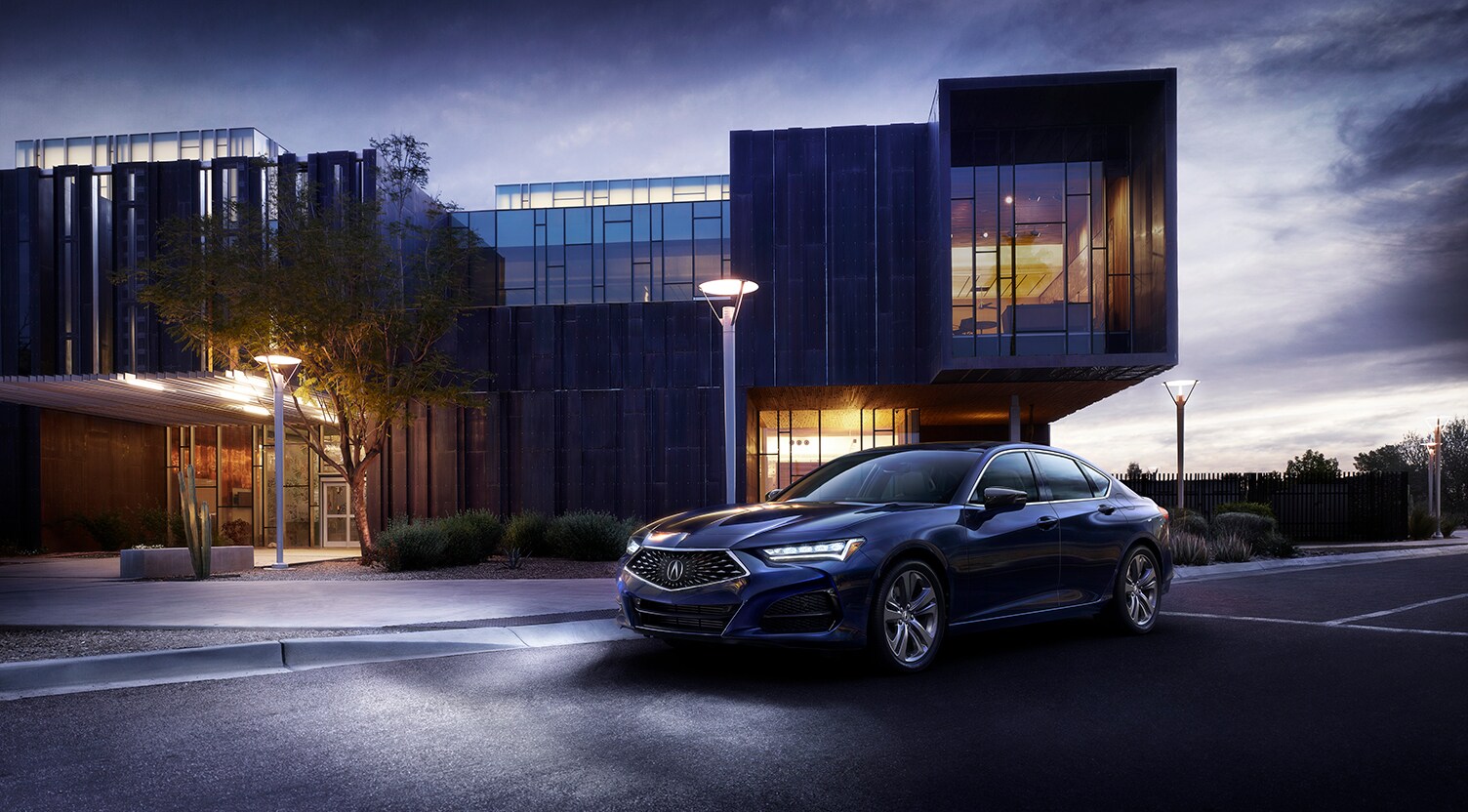 The 2021 Acura TLX vs. The 2022 Acura TLX at Bobby Rahal Acura | 2021 Acura TLX parked at night