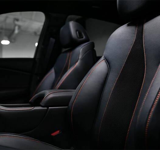 Compare the 2021 Acura RDX vs. the 2021 BMW X3 at Bobby Rahal Acura | Showing off driver and passenger seats