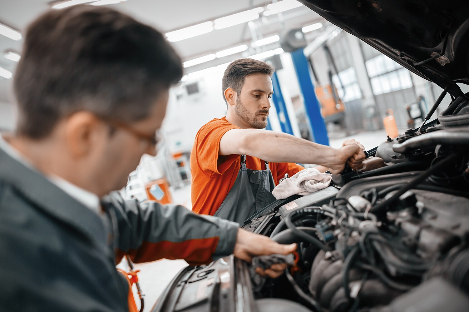 Bobby Rahal Acura is a Car Dealership near New Cumberland PA | Mechanic working under the hood of vehicle
