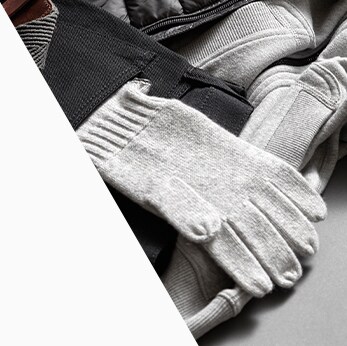 How to prepare your Acura for the winter season in Mechanicsburg, PA at Bobby Rahal Acura | Close-up of light gray gloves and black jacket