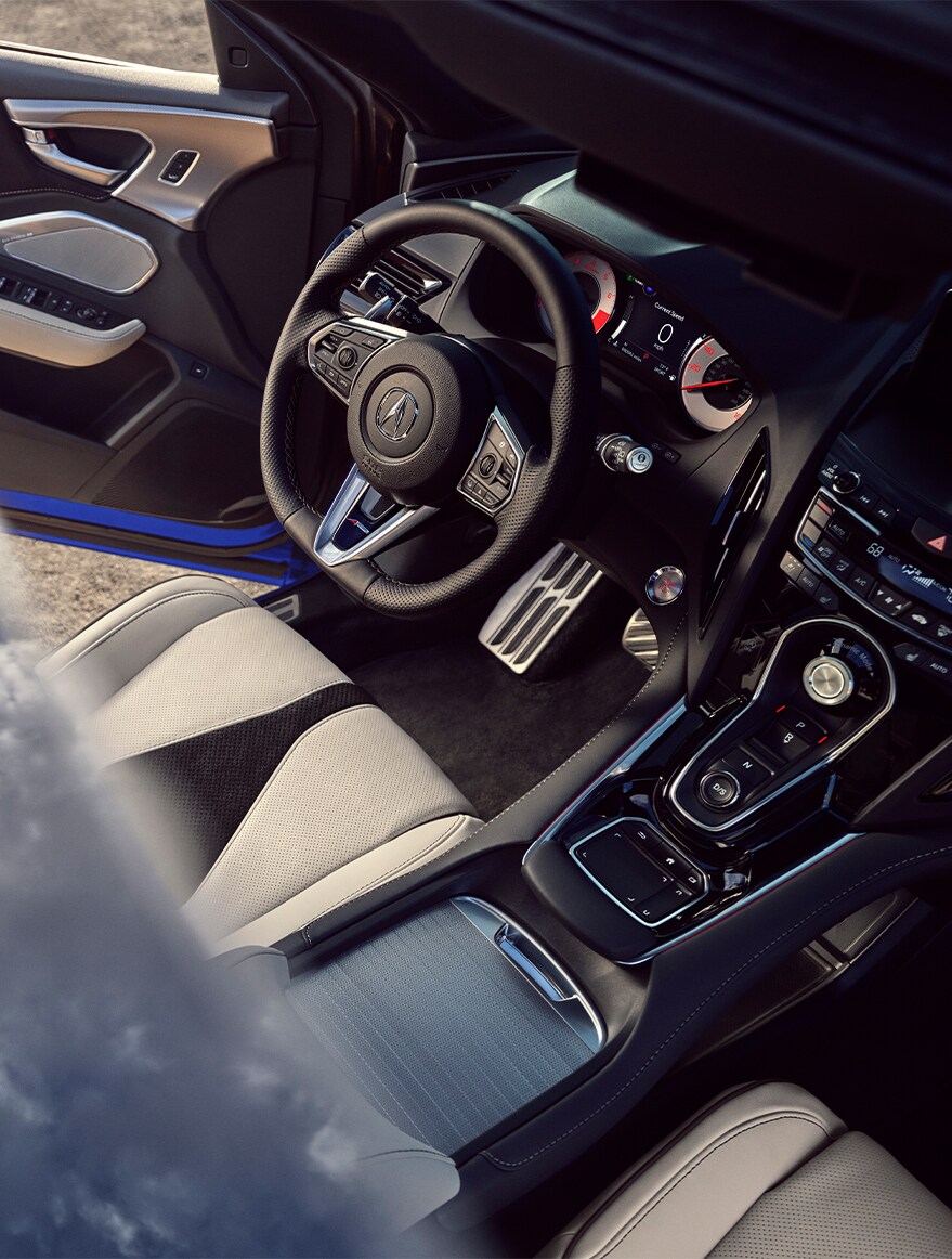 New 2023 Acura RDX at Bobby Rahal Acura | View from the sunroof of the black interior of 2023 Acura RDX
