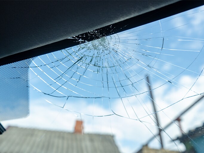 Chipped windshield At Bobby Rahal Acura in Mechanicsburg, PA | Big crack at the top of front windshield spreading out
