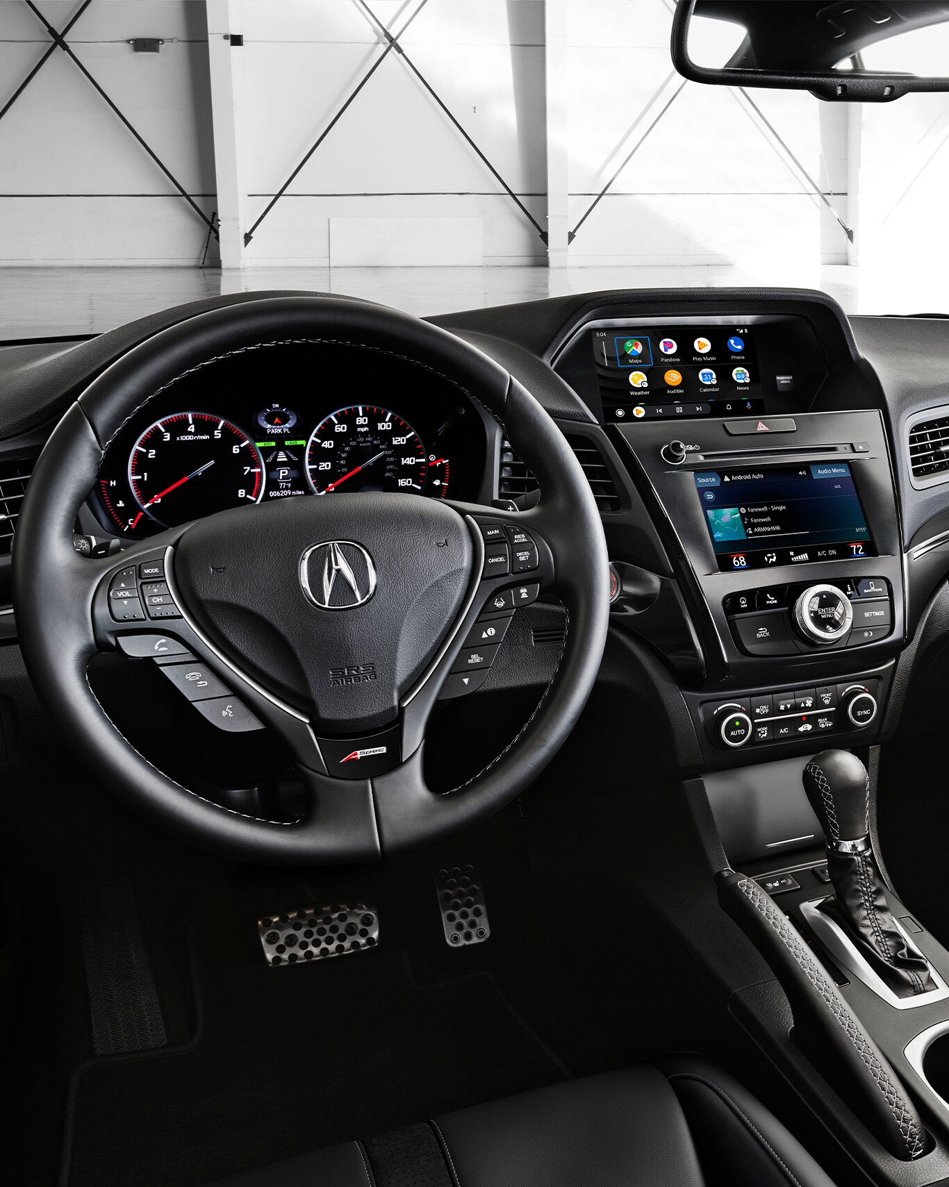 Android Auto vs. Apple CarPlay at Bobby Rahal Acura in Mechanicsburg, PA | Black interior of Acura ILX