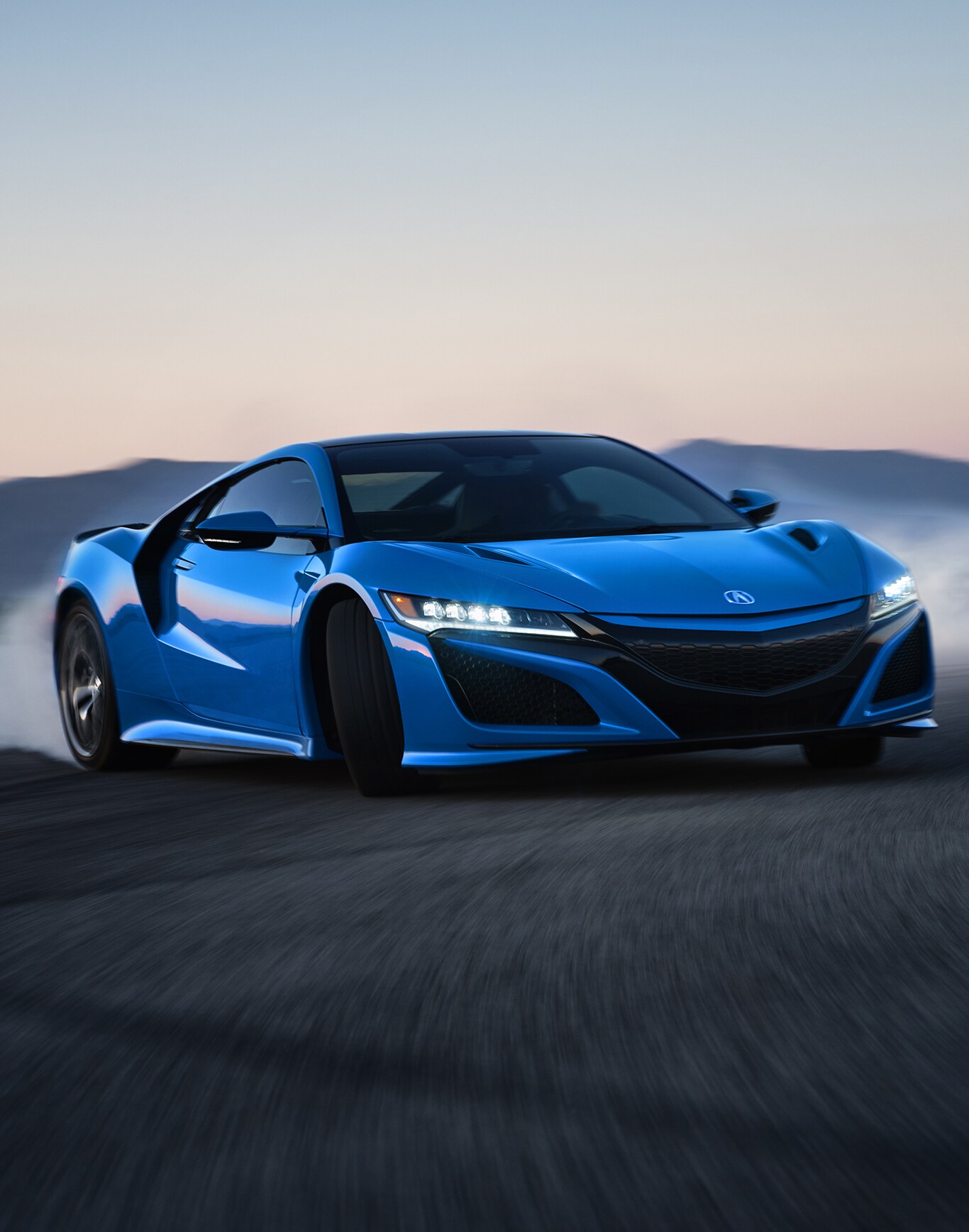 Learn about SH-AWD at Bobby Rahal Acura in Mechanicsburg, PA | Blue Acura NSX drifting on road