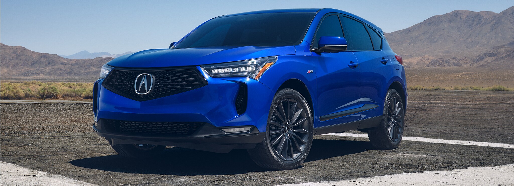 New 2023 Acura RDX at Bobby Rahal Acura | Blue 2023 Acura RDX parked outside on a nice sunny day