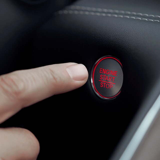 All-New 2022 Acura TLX at Bobby Rahal Acura | Finger Pushing Red Engine Start Button in 2022 Acura TLX