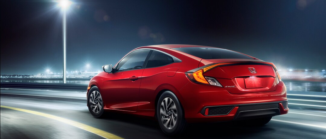 redciviccoupe.jpg red civic coupe driving away