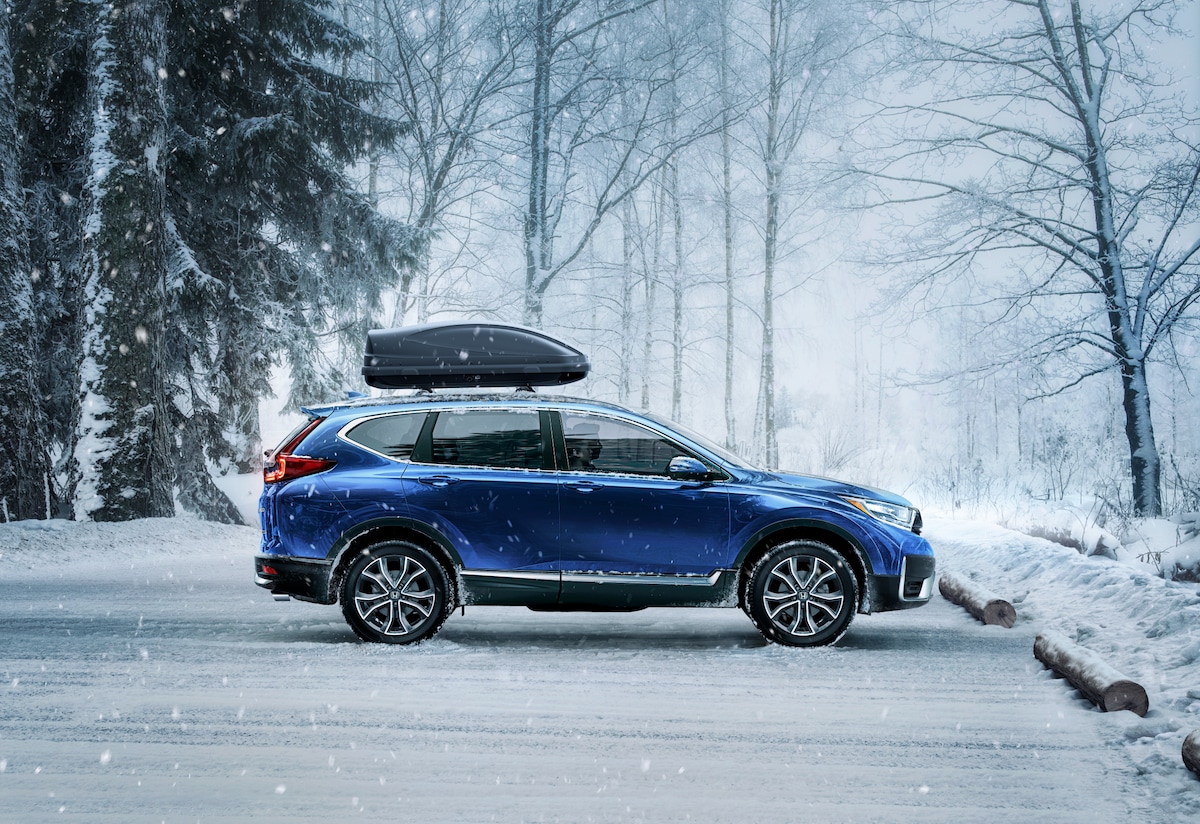 Car trade in tax credit at Bobby Rahal Honda in State College | Blue Honda parked in the snow Car trade in tax credit at Bobby Rahal Honda in State College | Blue Honda parked in the snow