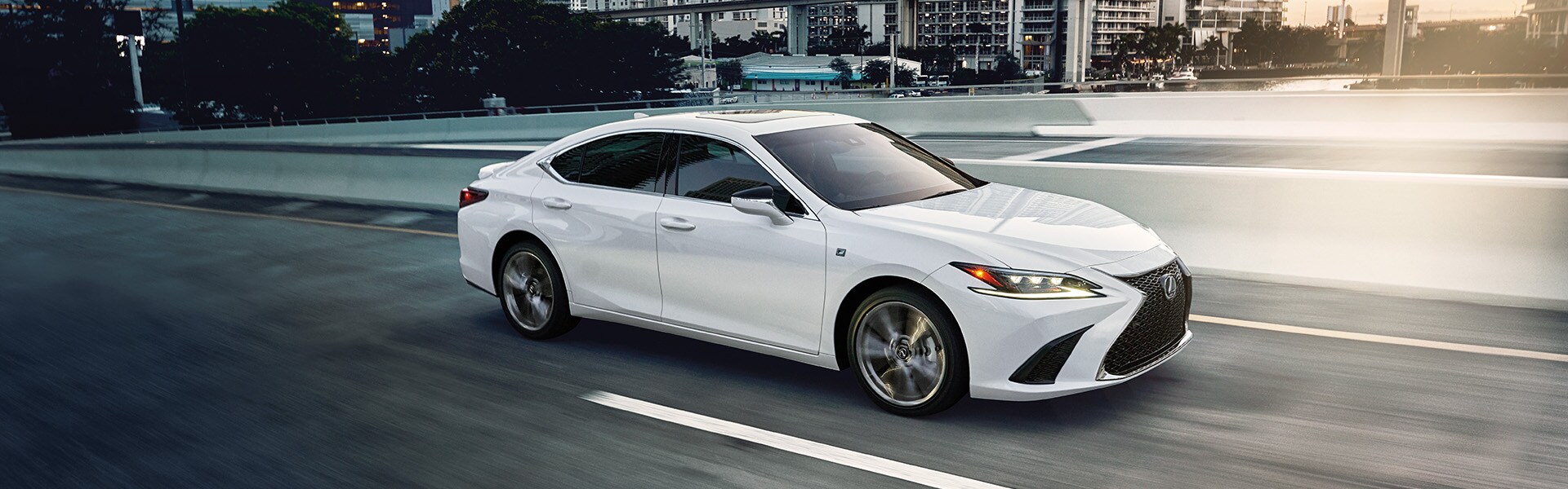 Lexus Dealer near Ephrata, PA | White Lexus ES Driving on City Highway