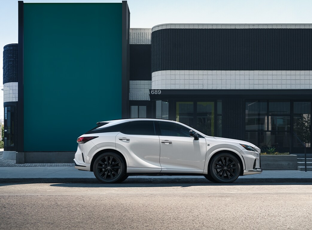 2023 Lexus RX at Bobby Rahal Lexus of Lancaster County in Ephrata, PA | Side profile of a white 2023 Lexus RX F-sport parked outside
