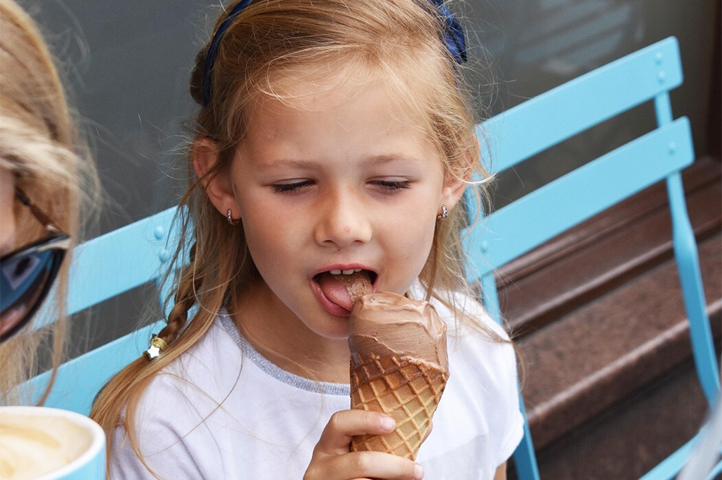 Lexus Dealer near Denver, PA | Young Strawberry Blonde Girl Eating Chocolate Ice Cream Cone