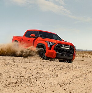 Toyota Hybrid for Everyone at Bobby Rahal Toyota | 2022 Tundra off roading in dirt and sand
