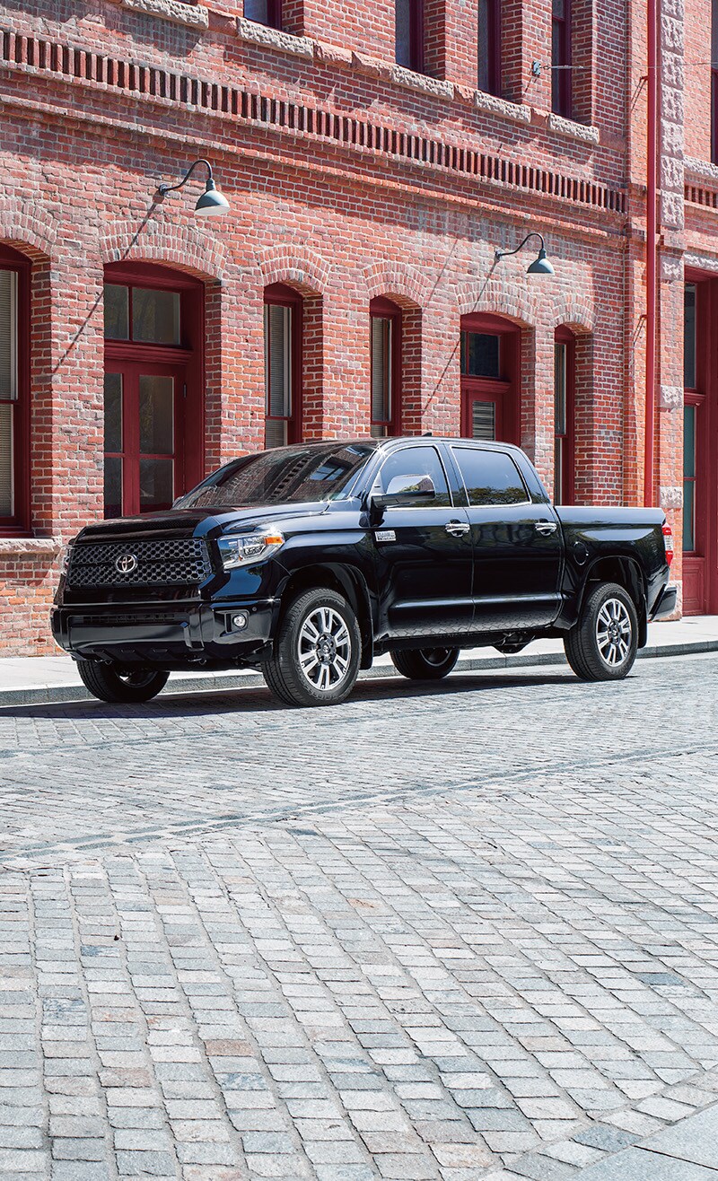 The 2022 Toyota Tundra vs. The 2021 Toyota Tundra at Bobby Rahal Toyota | Black 2021 Toyota Tundra Street Parked in City