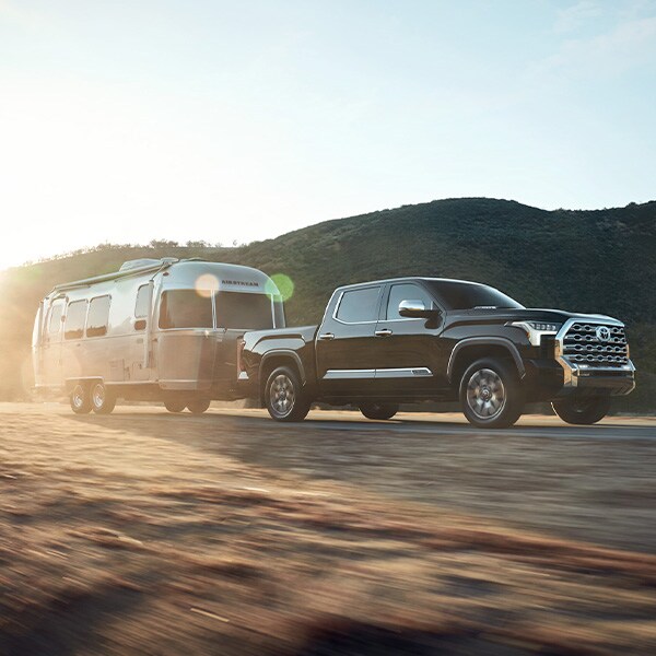 The All-New 2022 Toyota Tundra at Bobby Rahal Toyota in Mechanicsburg, PA | 2022 Toyota Tundra pulling a large trailer