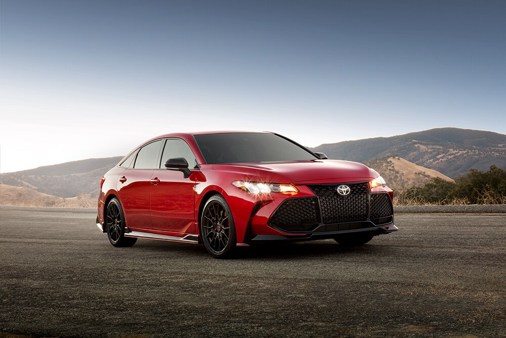 Bobby Rahal Toyota is a Car Dealership near Carlisle PA | 2021 Toyota Avalon parked on dirt road