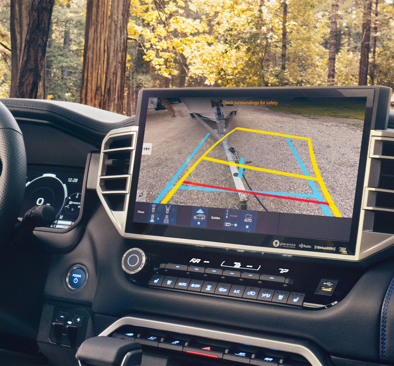 2023 Toyota Sequoia vs. 2023 Chevrolet Tahoe at Bobby Rahal Toyota | Interior view of the reverse camera displayed on the center console
