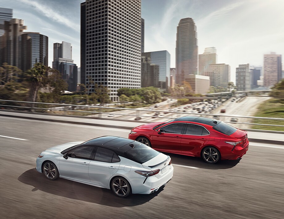 Comparison of the 2020 Toyota Camry AWD and the 2020 Subaru Legacy at Bobby Rahal Toyota of Mechanicsburg | Two 2020 Toyota Camrys racing