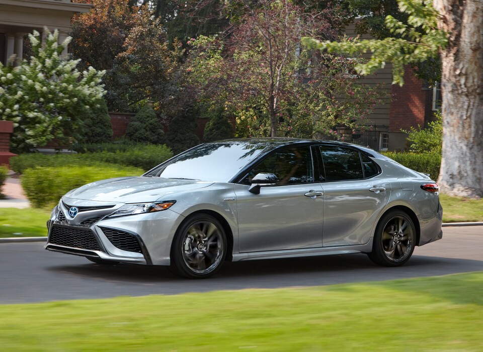 Defining APR at Bobby Rahal Toyota in Mechanicsburg, PA | The 2021 Toyota Camry Hybrid XSE Parked Outside of a House on a Bright and Sunny Day