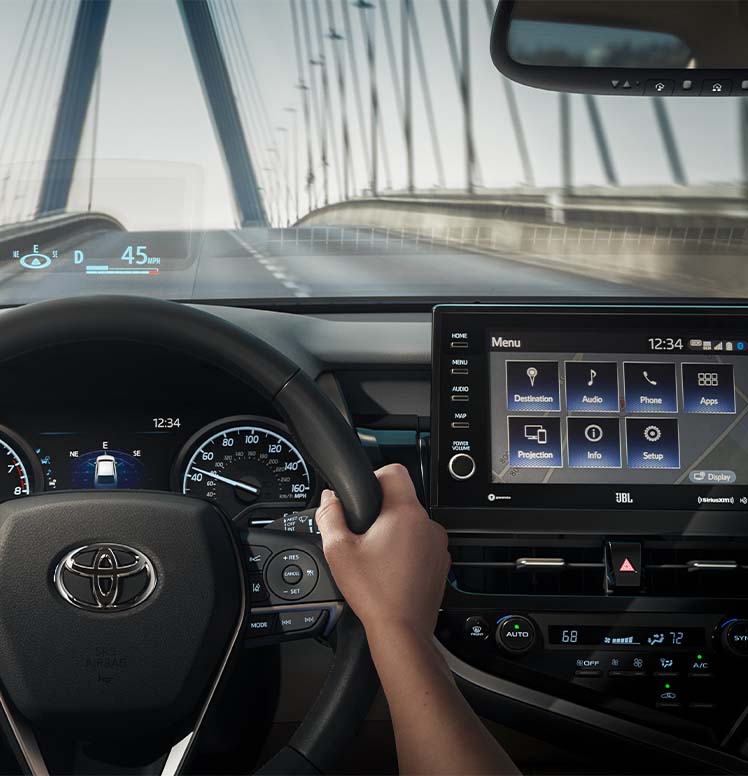 Model Features of the 2022 Toyota Camry at Bobby Rahal Toyota | Interior of the 2022 Toyota Camry - Featuring the Infotainment System and Head-Up Display