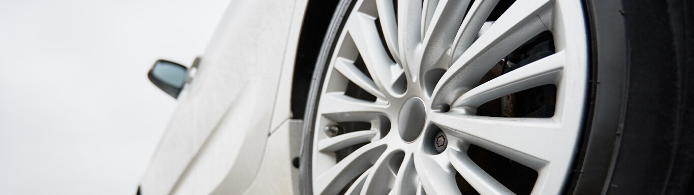 What is Tire and Rim Protection? | Bobby Rahal Toyota | View of silver rim and tire of a silver car