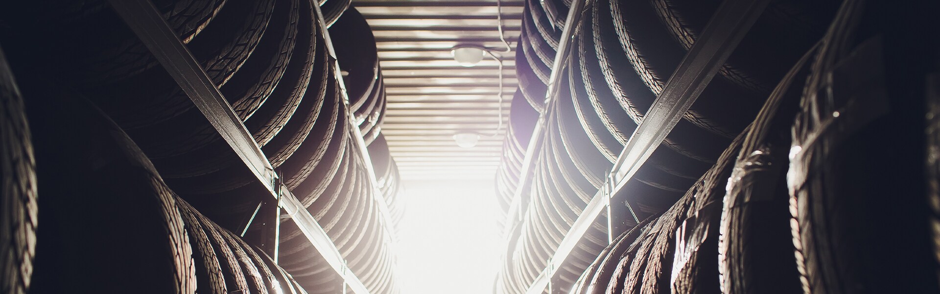 How to check your tires' health at Bobby Rahal Toyota of Mechanicsburg | A wide shot of fully loaded tire racks