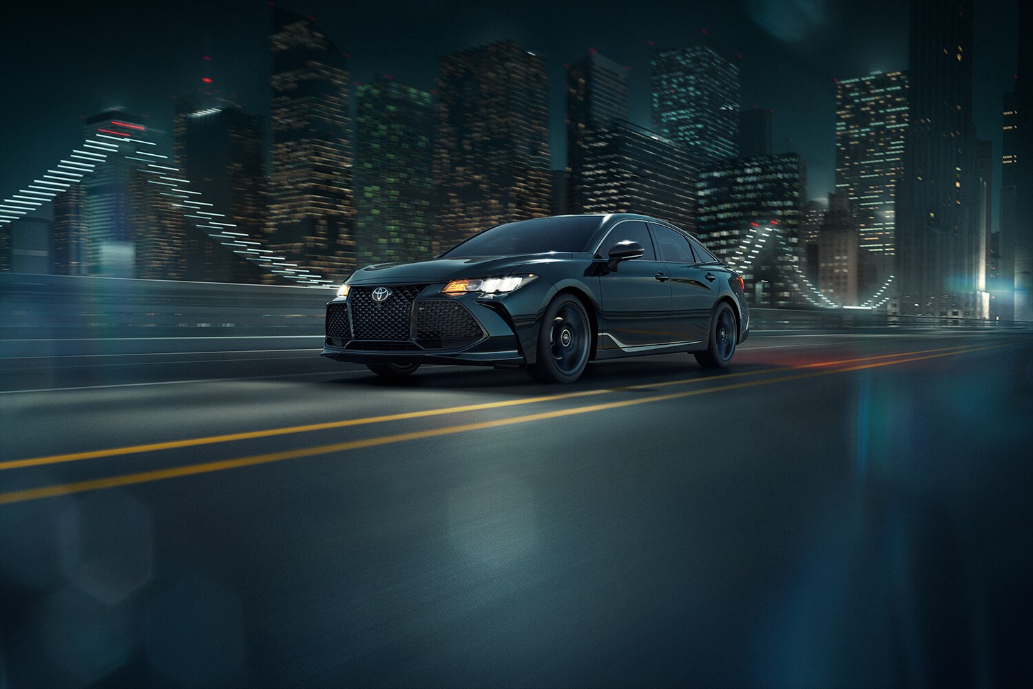 Bobby Rahal Toyota is a Car Dealership near New Cumberland PA | The 2021 Toyota Avalon drivng at night