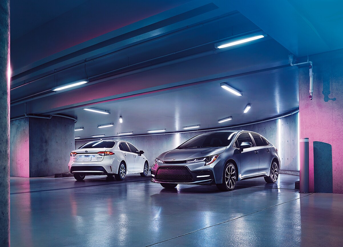 Compare the 2020 Honda Civic Sedan vs. the 2020 Toyota Corolla at Bobby Rahal Toyota of Lewistown | 2020 Corolla parked in parking lot