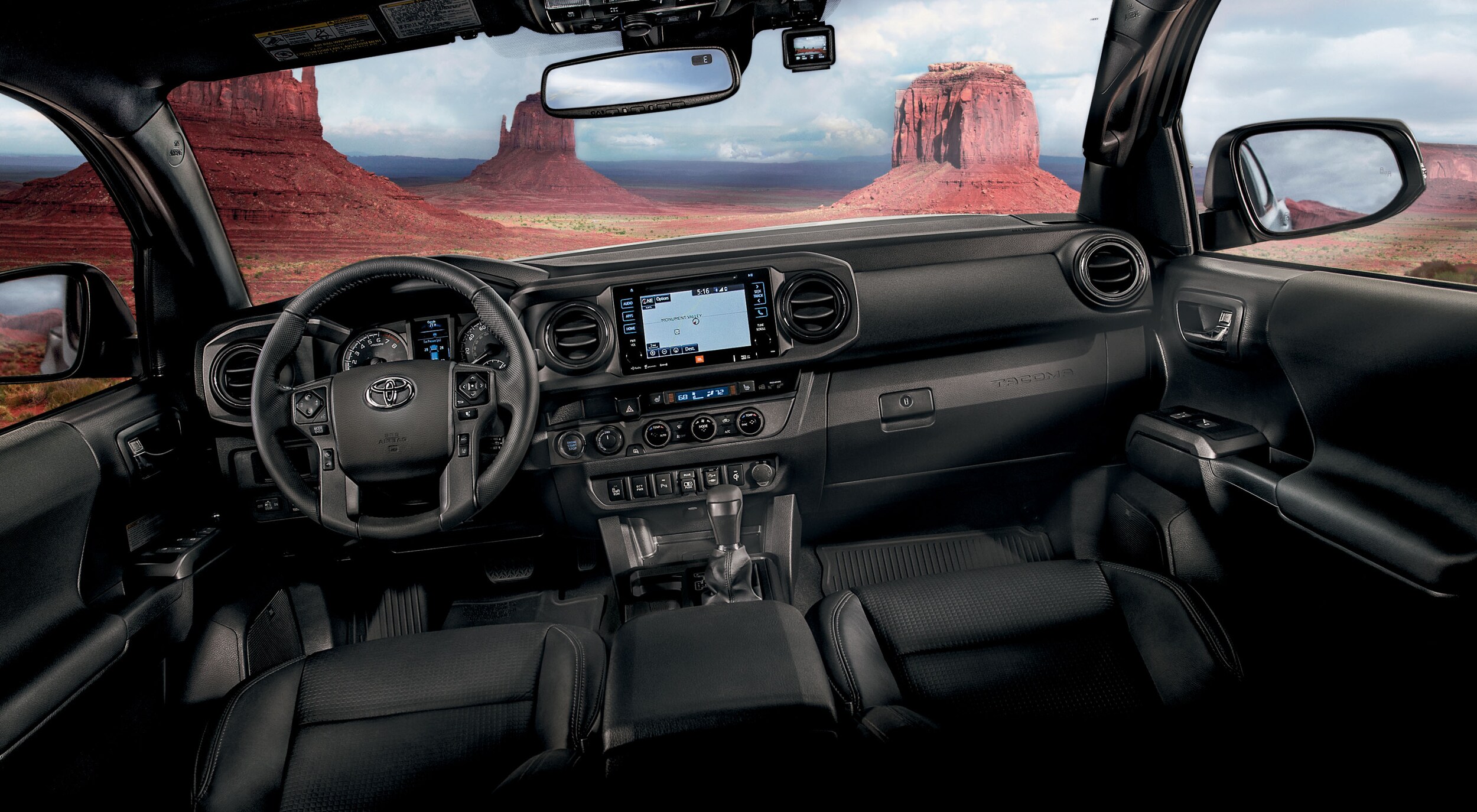 Interior view of the front seat of a 2018 Tacoma